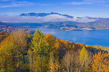 Image showing Autumn trees and mountain lake scene