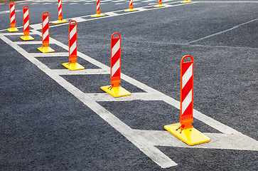 Image showing Traffic safety. Traffic markings on a gray asphalt. Red and whit