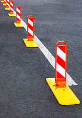 Image showing Traffic safety. Traffic markings on a gray asphalt. Red and whit