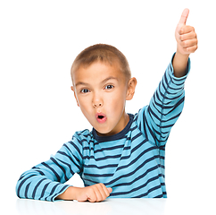 Image showing Little boy is showing thumb up sign