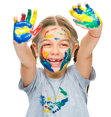 Image showing Portrait of a cute girl playing with paints