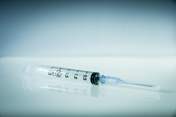 Image showing Syringe on grey background