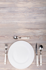 Image showing empty plate with knife and fork