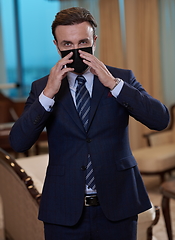 Image showing business man wearing protective face mask at office