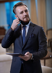 Image showing business man wearing protective face mask at office