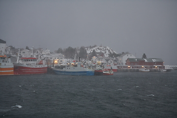 Image showing Traditional Norwegian fisherman\'s cabins and boats