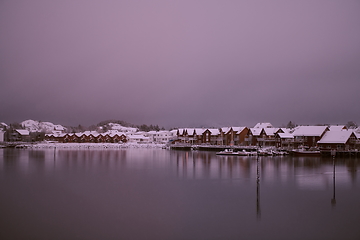 Image showing Traditional Norwegian fisherman\'s cabins and boats