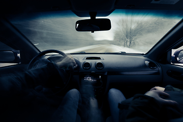 Image showing driving a car on winter road