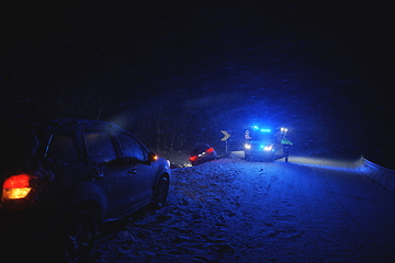 Image showing car accident on slippery winter road at night