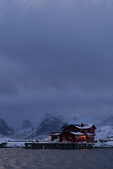 Image showing Traditional Norwegian fisherman\'s cabins and boats