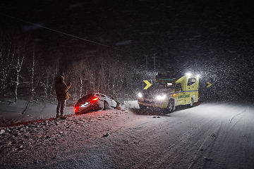 Image showing car accident on slippery winter road at night