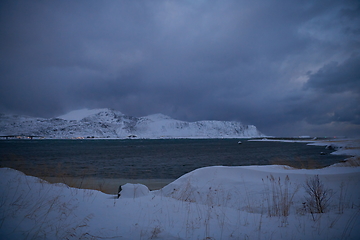 Image showing norway coast in winter with snow bad cloudy weather