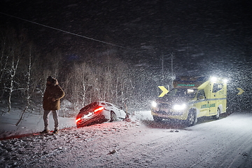 Image showing car accident on slippery winter road at night