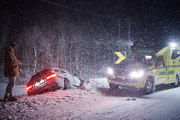 Image showing car accident on slippery winter road at night