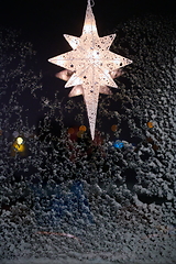 Image showing Star for lightning in the window and decoration during the winter time