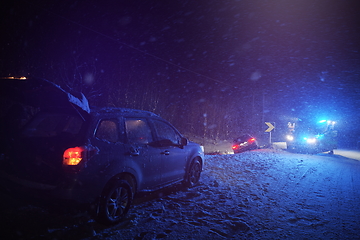 Image showing car accident on slippery winter road at night