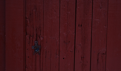 Image showing tradidional wooden wall of a red house in Norway