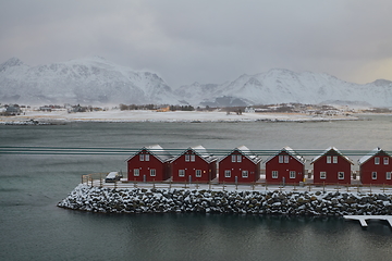 Image showing Traditional Norwegian fisherman\'s cabins and boats