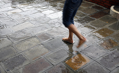 Image showing Walking in the rain