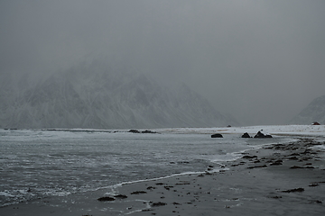 Image showing norway coast in winter with snow bad cloudy weather