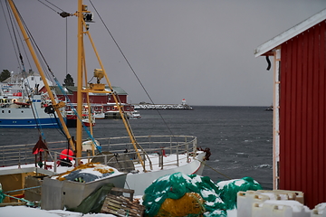 Image showing Traditional Norwegian fisherman\'s cabins and boats