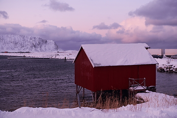 Image showing Traditional Norwegian fisherman\'s cabins and boats