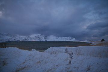 Image showing norway coast in winter with snow bad cloudy weather