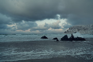 Image showing norway coast in winter with snow bad cloudy weather