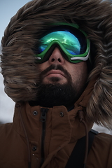 Image showing man at winter in stormy weather wearing warm fur jacket