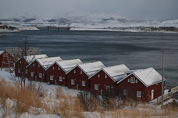 Image showing Traditional Norwegian fisherman\'s cabins and boats