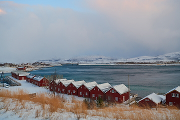 Image showing Traditional Norwegian fisherman\'s cabins and boats