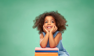 Image showing little african american schoolgirl with books