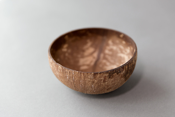 Image showing close up of coconut bowl on table