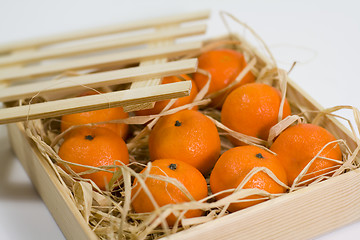 Image showing tangerines with straw