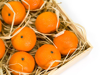 Image showing tangerines with straw