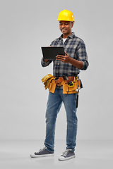 Image showing happy indian builder in helmet with tablet pc