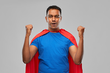 Image showing indian man in superhero cape makes winning gesture