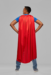 Image showing happy smiling indian man in red superhero cape