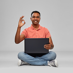 Image showing happy indian man with laptop computer showing ok