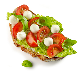 Image showing slice of bread with tomato and mozzarella