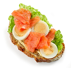 Image showing slice of bread with egg and salmon
