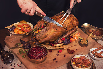 Image showing Roasted goose with herbs berries and vegetables