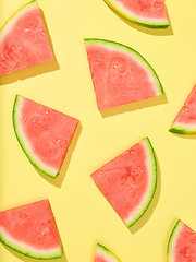 Image showing watermelon slices on yellow background