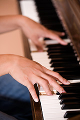 Image showing Playing piano