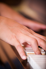 Image showing Playing piano