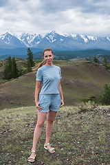 Image showing Woman on the big mountain background