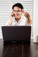 Image showing Asian entrepreneur thumbs up