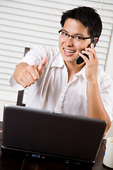 Image showing Asian entrepreneur thumbs up