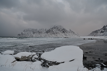 Image showing norway coast in winter with snow bad cloudy weather