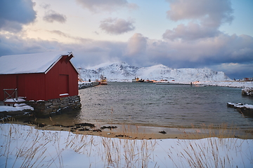 Image showing Traditional Norwegian fisherman\'s cabins and boats